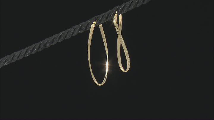 10k Yellow Gold 1 9/16" Diamond-Cut Oval Hoop Earrings Video Thumbnail
