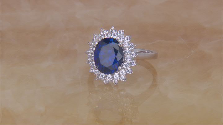 Blue lab created sapphire rhodium over silver ring 4.77ctw