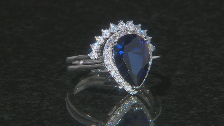 Lab Created Blue Sapphire and White Cubic Zirconia Rhodium Over Sterling Ring With Band 6.40ctw Video Thumbnail