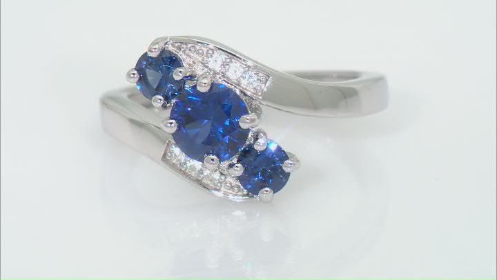 Blue Lab Created Sapphire Rhodium Over Sterling Silver Bypass Ring 1.40ctw Video Thumbnail