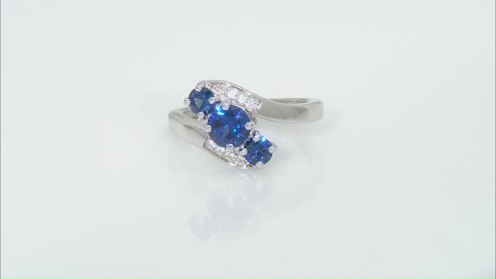Blue Lab Created Sapphire Rhodium Over Sterling Silver Bypass Ring 1.40ctw Video Thumbnail