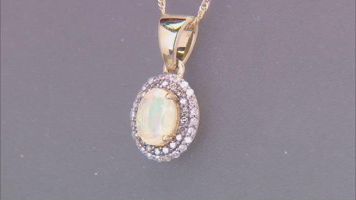 Ethiopian Opal With White And Champagne Diamond 10k Yellow Gold Pendant With Chain 0.70ctw Video Thumbnail