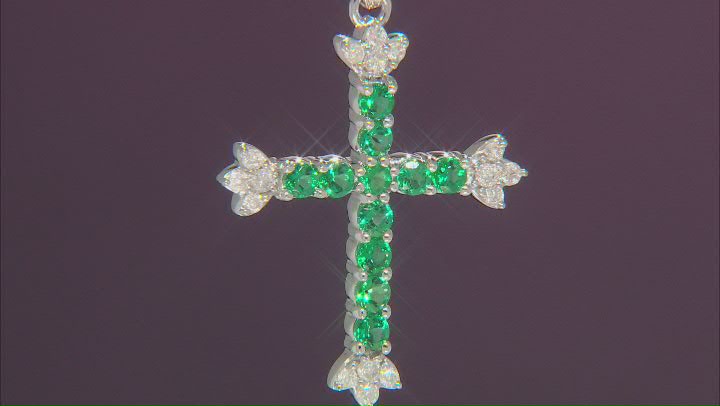 Green Lab Created Emerald And White Diamond Rhodium Over Sterling Silver Cross Pendant 0.70ctw Video Thumbnail