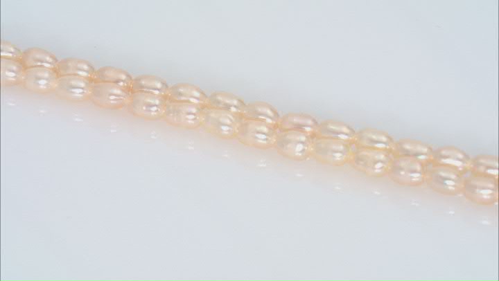 Peach 2.5-3x4-4.5mm Rice Shape Freshwater Cultured Pearl Bead Strand Set of 2 Video Thumbnail