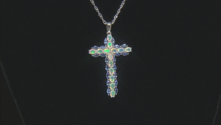 Blue tanzanite rhodium over sterling silver cross pendant with chain 2.55ctw