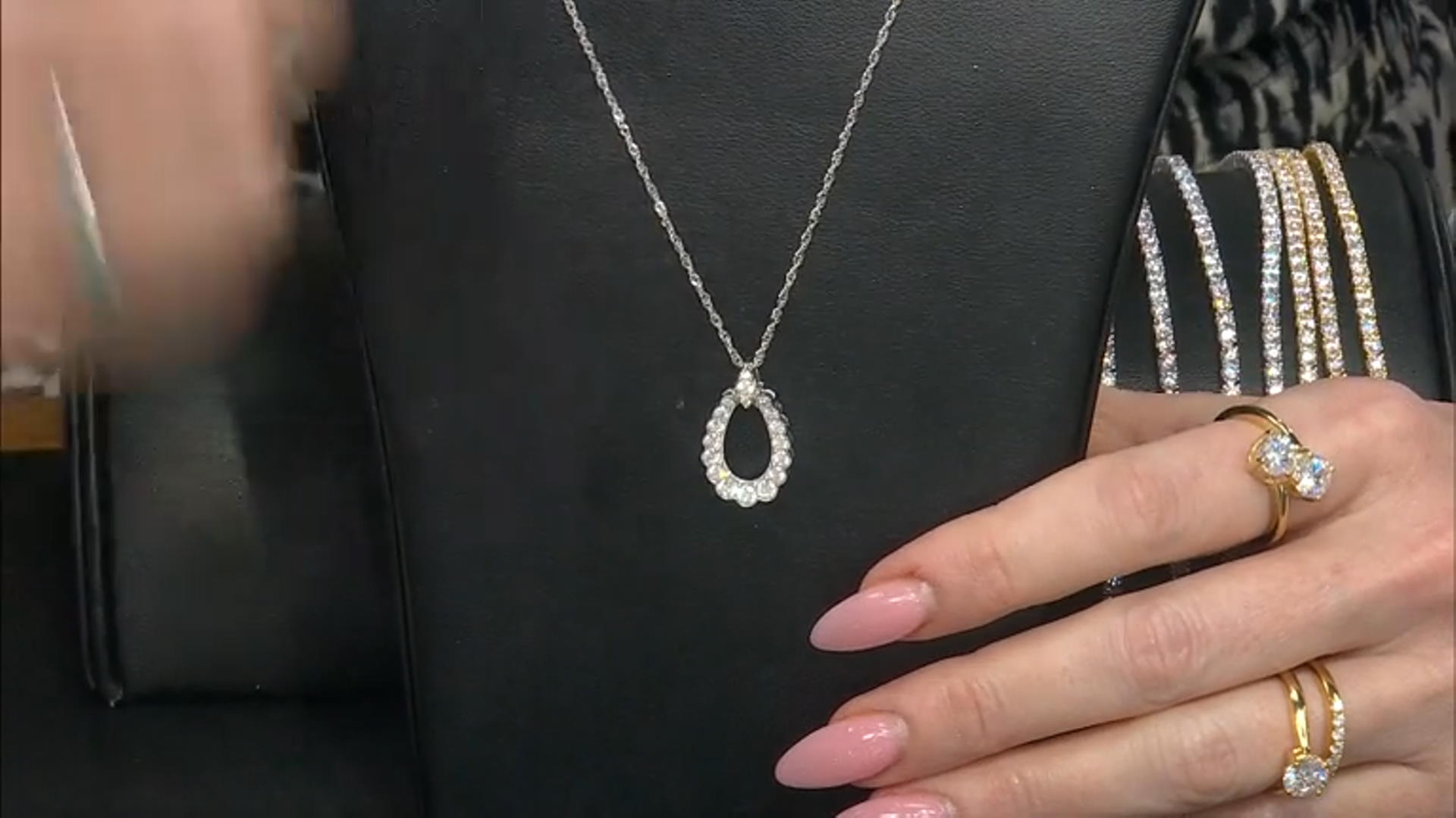 Moissanite Platineve Graduated Pendant .96ctw DEW Video Thumbnail