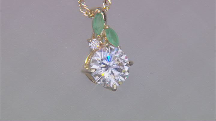 Moissanite Fire® 1.53ctw DEW Moissanite and .12ctw Emerald 14k Yellow Gold Over Silver Pendant Video Thumbnail