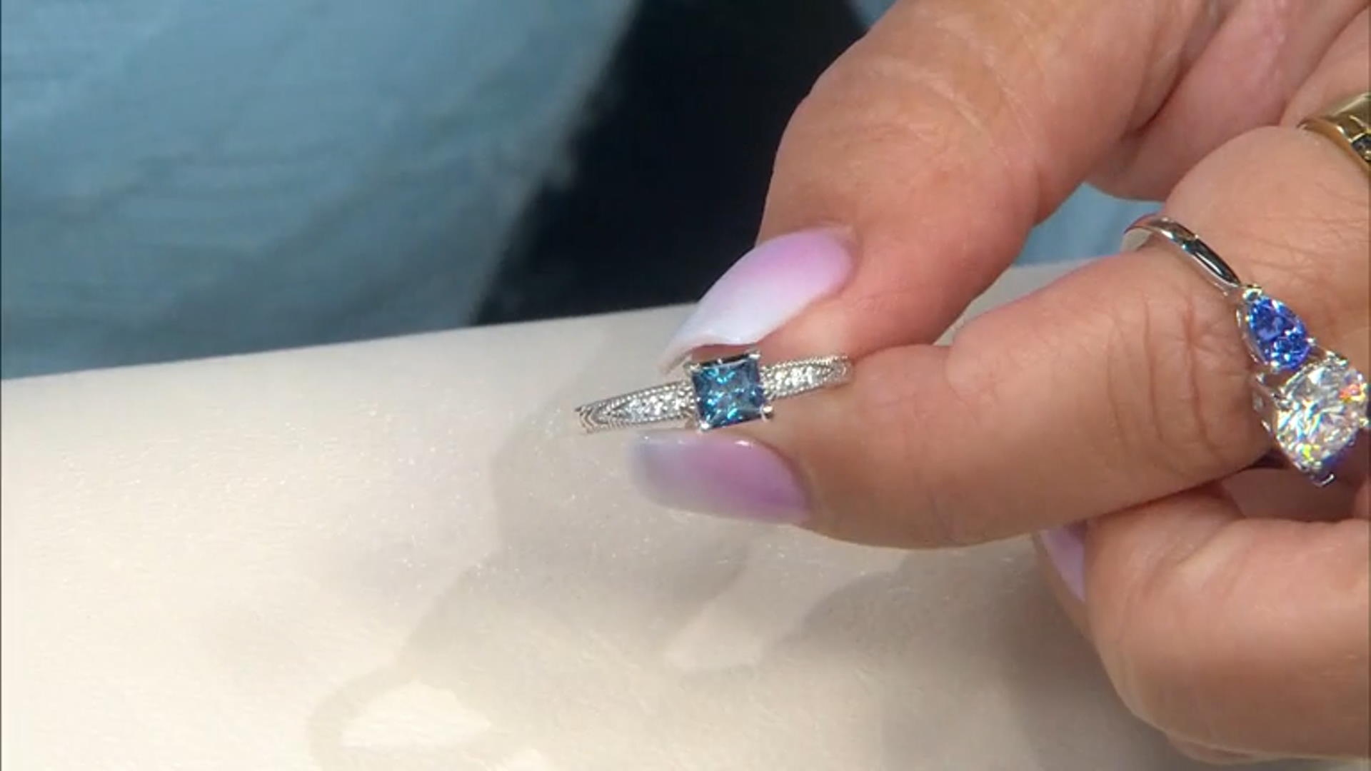 Blue and colorless moissanite platineve ring .79ctw DEW Video Thumbnail