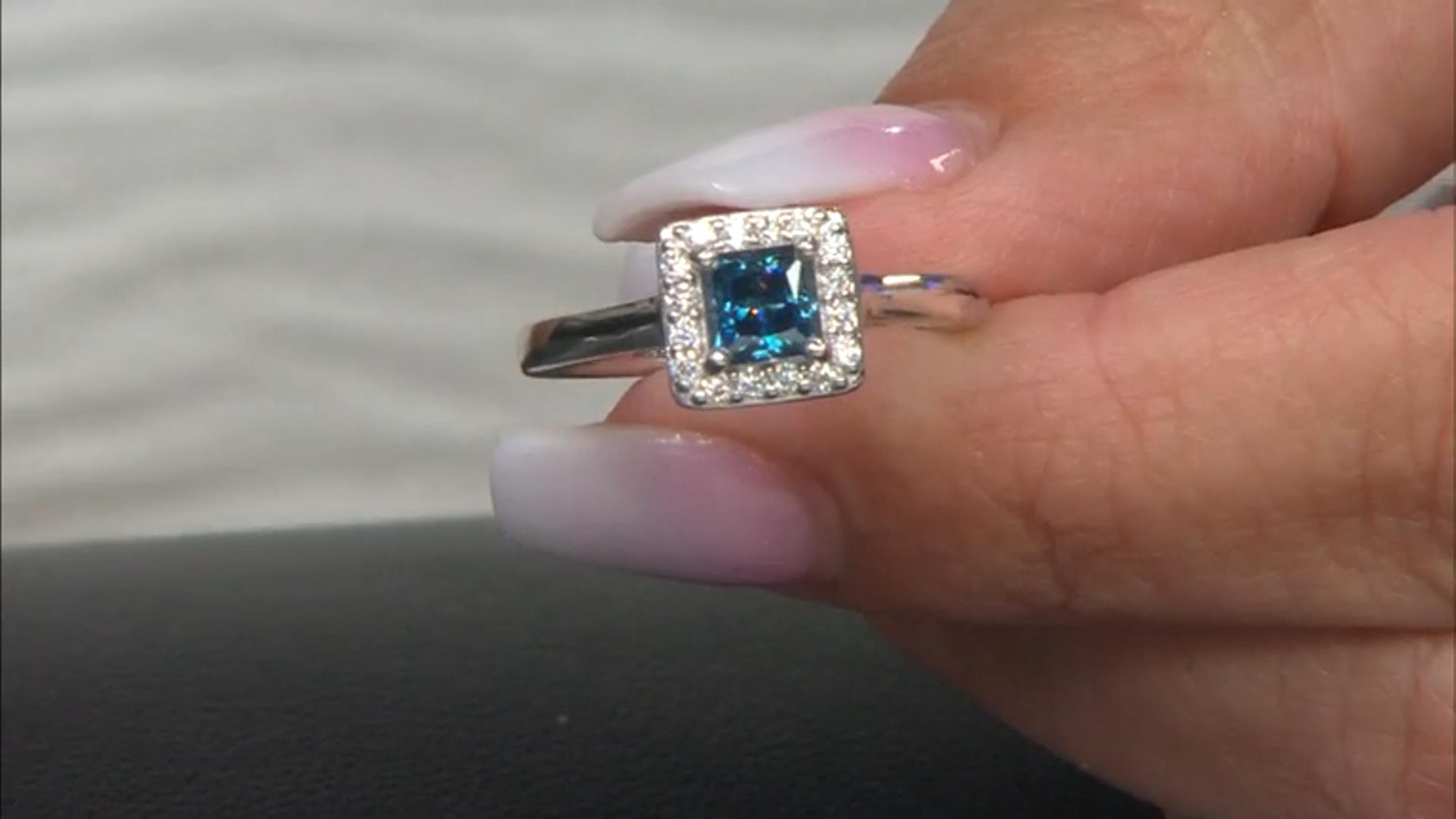 Blue and colorless moissanite platineve halo ring .90ctw DEW Video Thumbnail