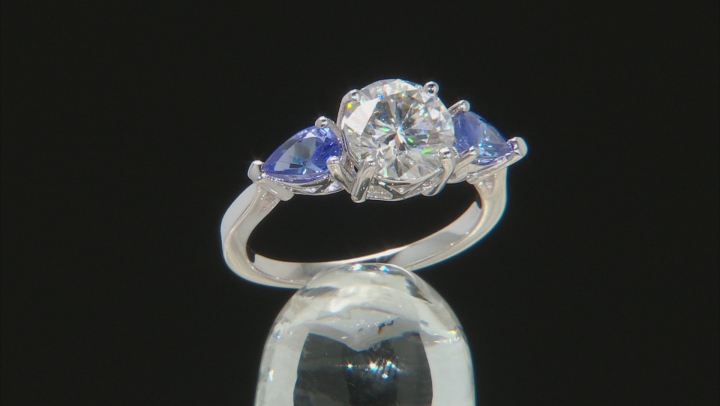 Moissanite Fire 1.90ct DEW Round And .78ctw Pear Shape Tanzanite Platineve Ring Video Thumbnail