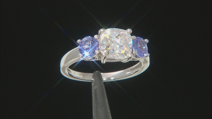 Moissanite Fire® 2.00ct DEW Cushion Cut And 1.04ctw Round Tanzanite Platineve™ Ring Video Thumbnail