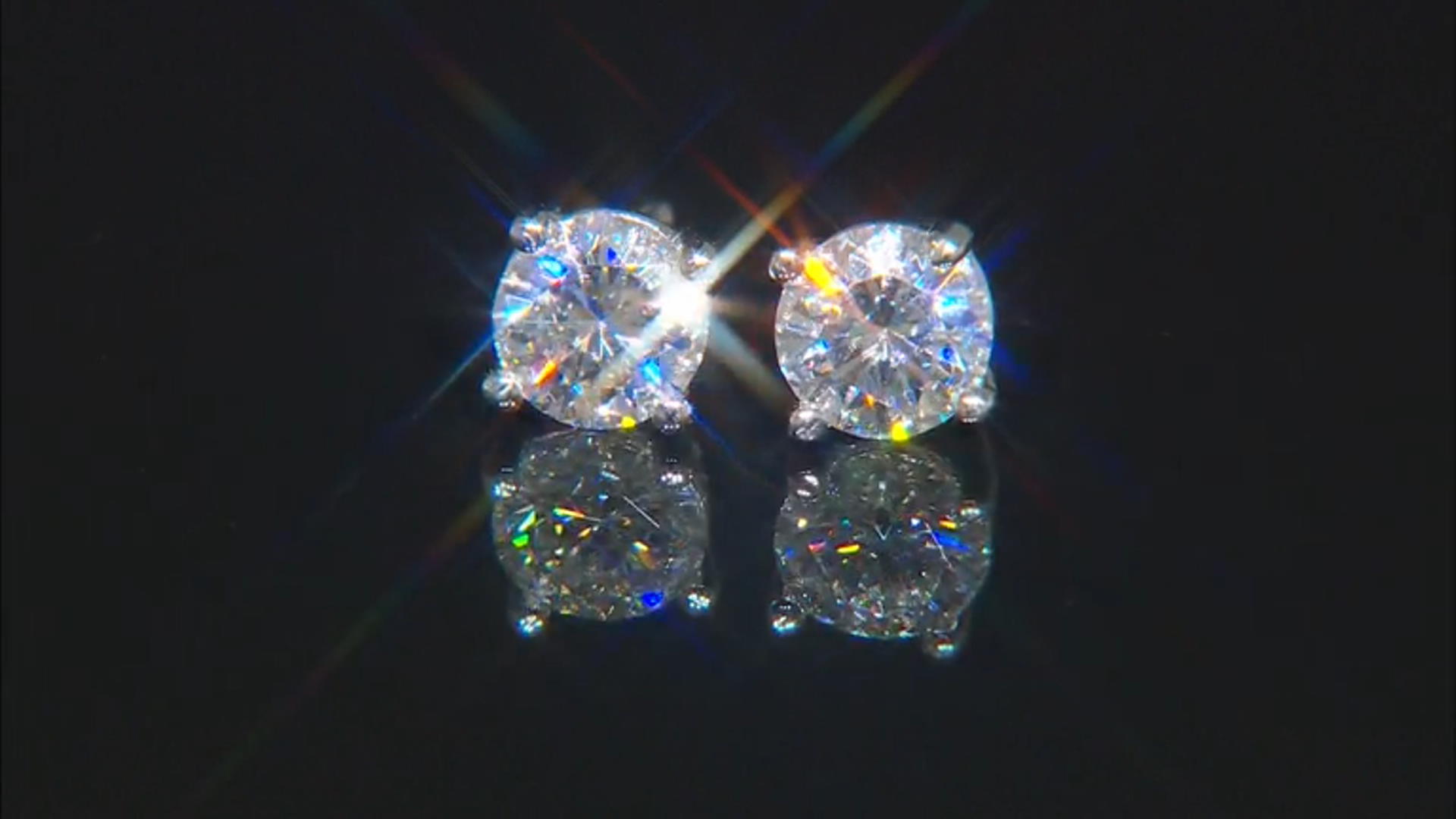 Moissanite 10k White Gold Stud Earrings 1.00ctw DEW. Video Thumbnail