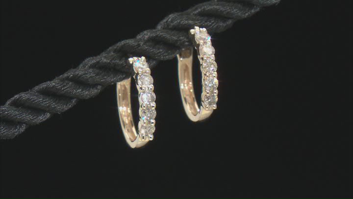 Candlelight Diamonds™ 10k Yellow Gold Huggie Hoop Earrings 0.33ctw Video Thumbnail