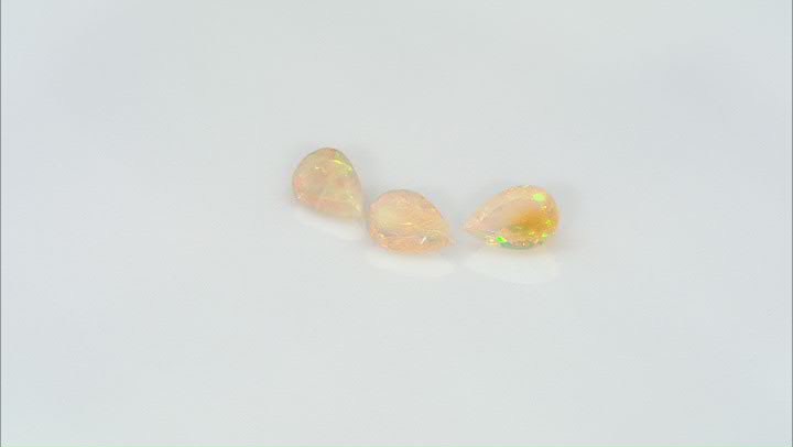 Ethiopian Opal 8x12mm Pear Shape Set of 3 5.40ctw Video Thumbnail