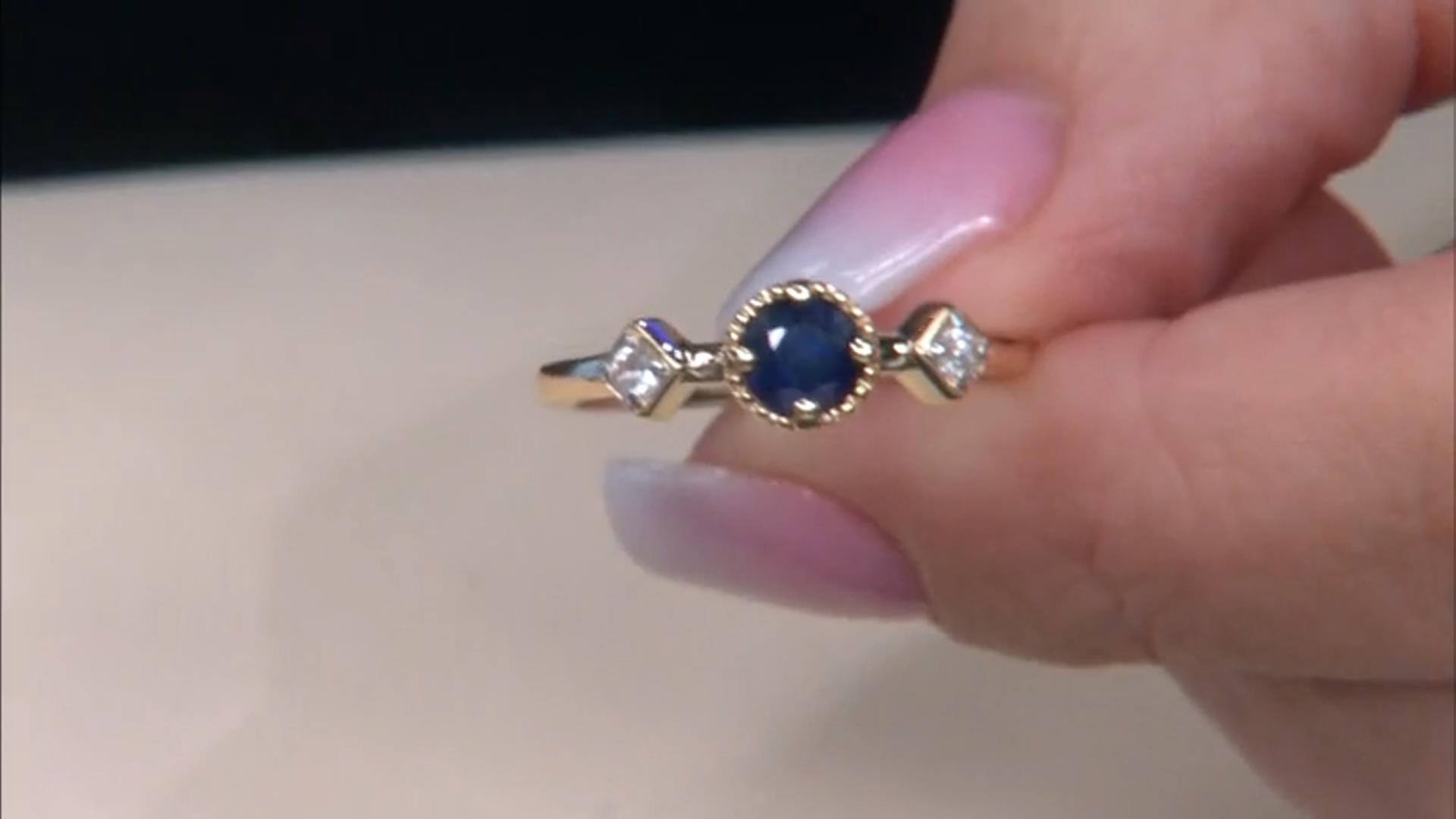 0.51ct Round Blue Sapphire with 0.14ctw Round White Zircon 14K Yellow Gold Ring Video Thumbnail